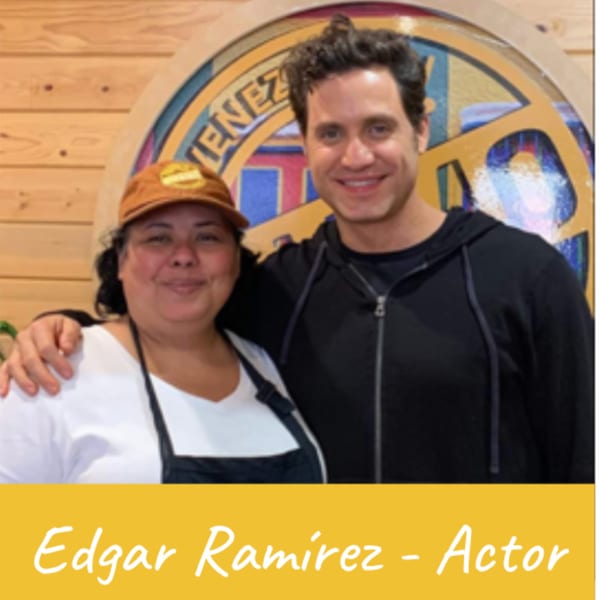 Venezuelan Chamo Cuisine owner and actor Edgar Ramírez smiling with arms around each other.